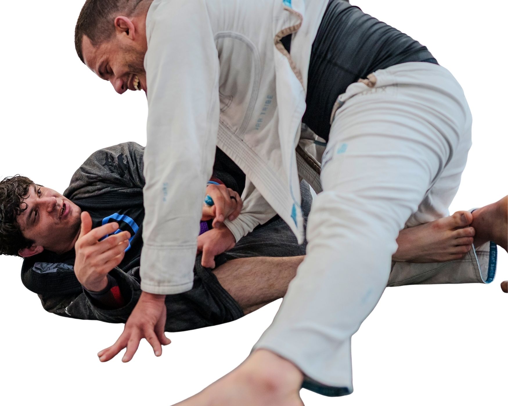 Brazilian Jiu-Jitsu coach working one-on-one with a student during a private lesson.