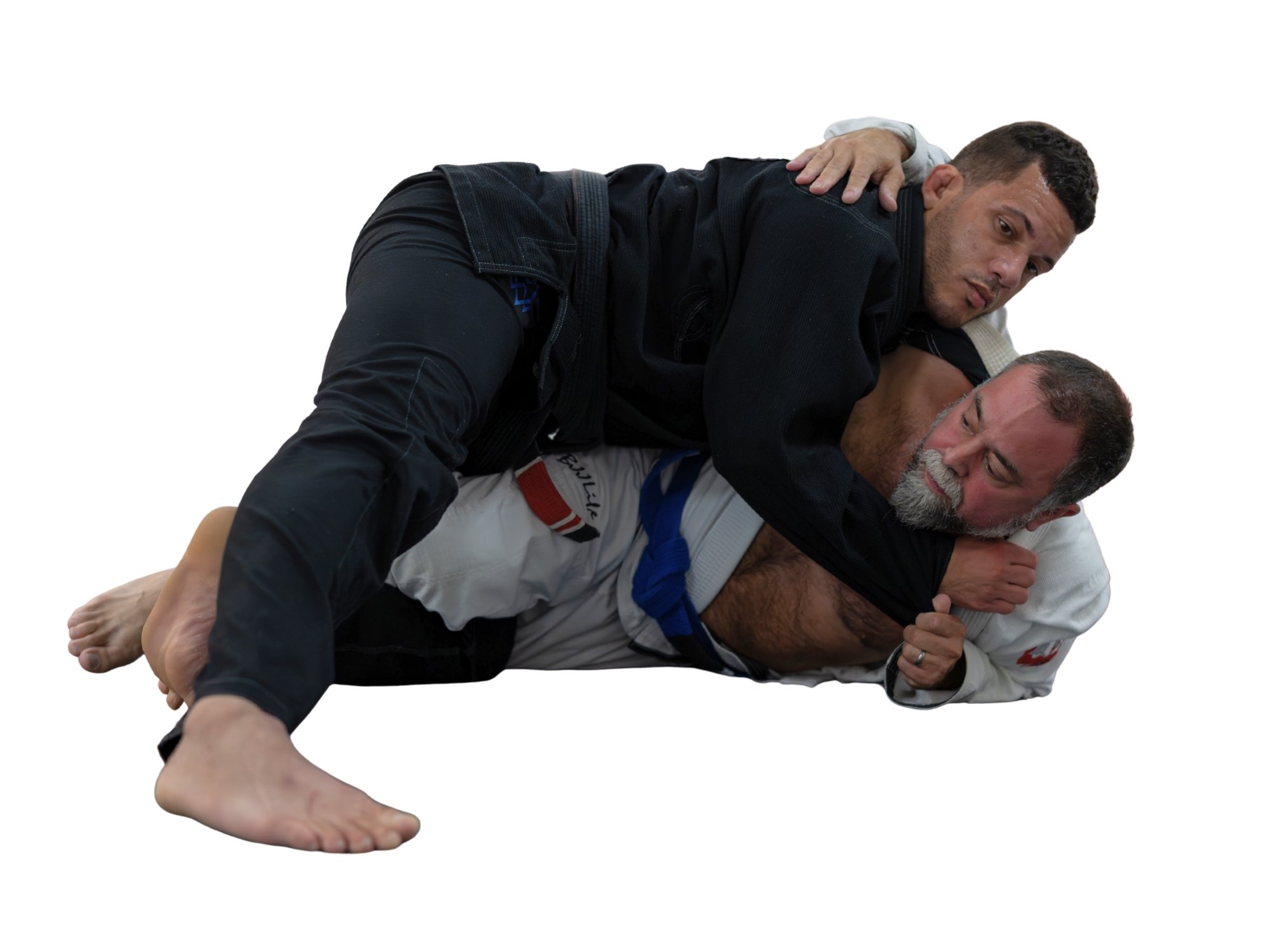 Jiu-Jitsu instructor demonstrating tight side control during a private training session.