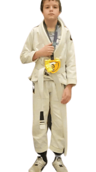 Student holding a medal after class